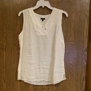 Crisp white sleeveless linen v-neck top
